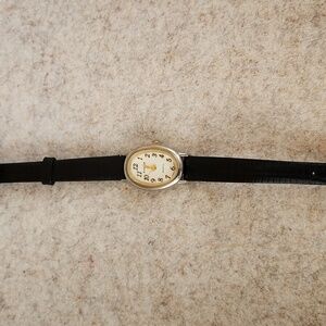 Watch by Sharp womens thin band battery watch. Delicate oval face and 14" black